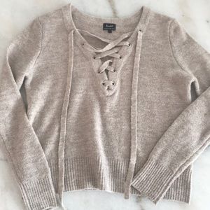 Beige lace up sweater